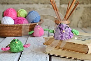 Colored crochet bird. Toy for babies or trinket.  Handmade gift. DIY crafts concept