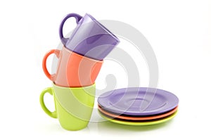 Colored cups with plates