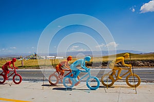 Colored cyclist sculptures