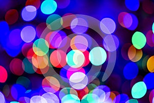 Colored defocused lights background. Abstract bokeh lights