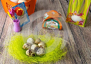 Colored different Easter eggs table decoration with postcard