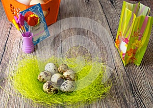 Colored different Easter eggs table decoration with postcard
