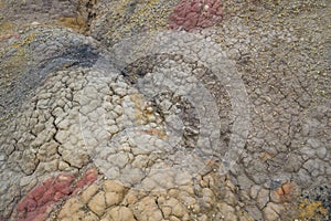Colored earth dirt in the cracks, the texture
