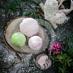 Colored Easter cakes with a rim on a plate. Easter