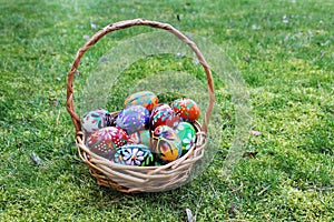 Colored easter eggs in basket