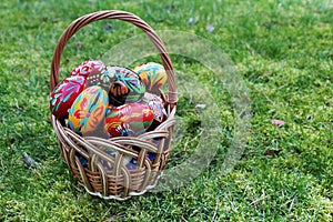 Colored easter eggs in basket