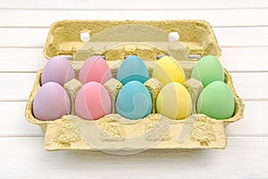 Colored Easter eggs in box decoration