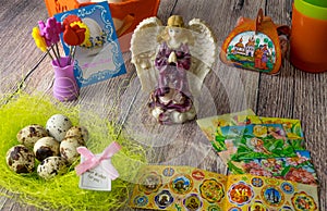 Colored Easter eggs table decoration with angel