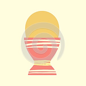 Colored egg in cup vector illustration. Easter meal. Boiled painted yellow egg served in pink egg holder decorated with