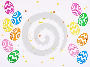 Easter composition. Colored eggs composition flat lay on white background, close up