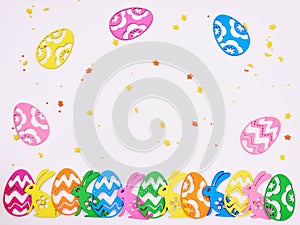 Easter composition. Colored eggs composition flat lay on white background, close up
