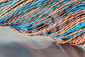 Colored electric telecommunication cables and wire
