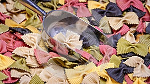 Colored Farfalle Pasta bow tie pasta background