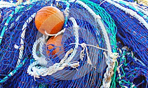 colored fishing net with floats. Selective focus.