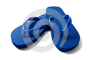 Colored flipflops on a white background