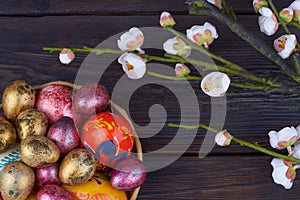 Colored foiled easter eggs and flowers.