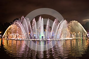 Colored fontain at night lights