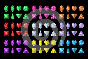 Colored gems set. Jewelry, crystals collection isolated on black background. Precious stones of different shapes, cut