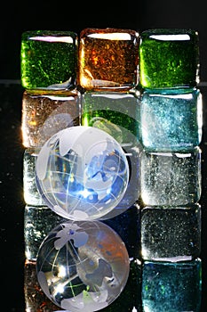 Colored glass blocks and globe