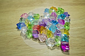 Colored glass marble heart with shining