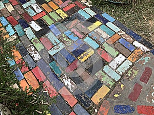 The colored glazed bricks walkway in the garden.