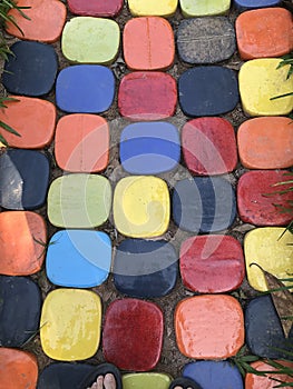 The colored glazed paving bricks walkway in the garden