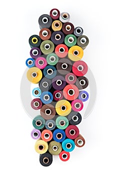 Group of colored sewing threads as colorful background