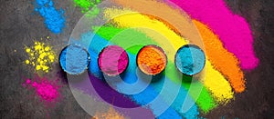 Colored holi powder in bowls. Holi festivals. View from above photo