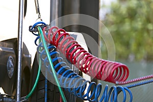 Colored hoses connection of big semi truck photo