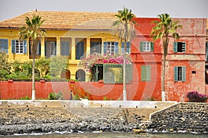 Colored houses on the Island of Goree, Senegal photo