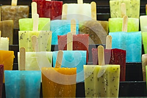 Colored ice lollies in an ice cream shop