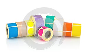 Colored label rolls isolated on white background with shadow reflection. Color reels of labels for printers. Labels for direct the