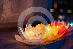 Colored lanterns and garlands at night on Vesak day for celebrating Buddha`s birthday in Eastern culture, that made from paper an