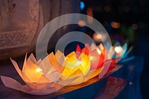 Colored lanterns and garlands at night on Vesak day for celebrating Buddha`s birthday in Eastern culture, that made from paper an