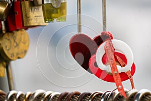 Colored locks hanging on the bridge for love