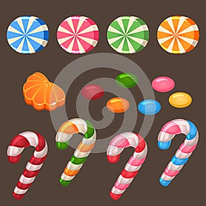 Colored lollipops candy set on dark background