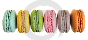 Colored macarons isolated on white background without a shadow closeup. Top view. Flat lay