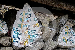 Colored Mani Stones with Buddhist mantra in Himalaya, Nepal