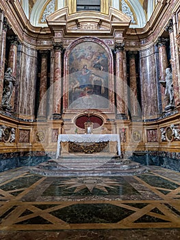 Color marble altarpiece with columns and painting in the church Santa Maria Maddalena dei Pazzi, Florence ITALY photo