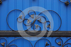 Colored metal texture of black wrought iron bars in a pattern