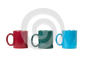 Three colored mugs isolated on a white background