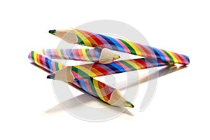 Colored multicolored pencils for drawing on white background isolated, school kids