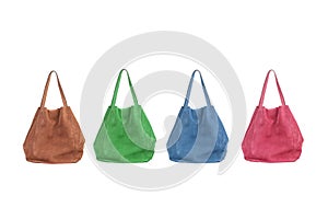 Colored nubuck handbags isolated on white
