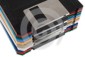 Colored old retro floppy diskettes in stack