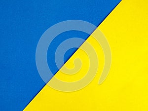 Colored paper in blue and yellow, divided in half, diagonally
