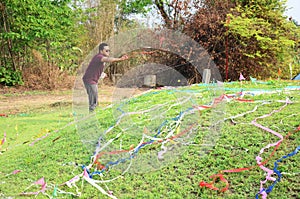 Colored papers placed and Flower on Grave in Qingming Festival
