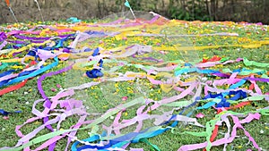 Colored papers placed and Flower on Grave in Qingming Festival