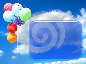 Colored party balloons against blue sky