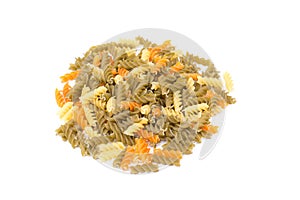 Colored pasta on white background