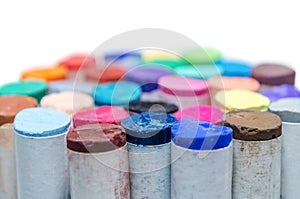 Colored pastel chalks isolated on white background